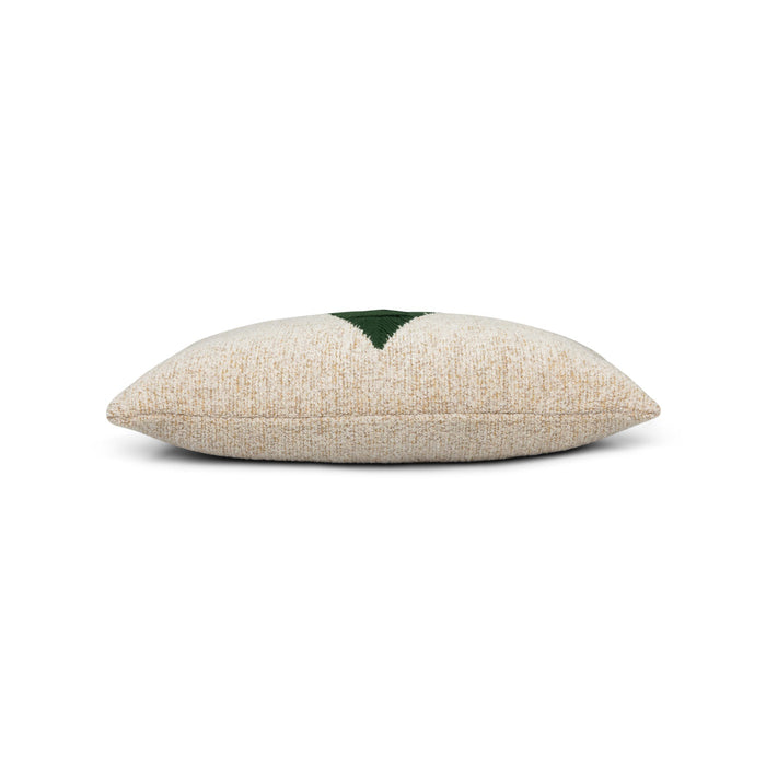 Side image of Ivory outdoor pillow with holiday tree hand sewn detail for chic outdoor decor