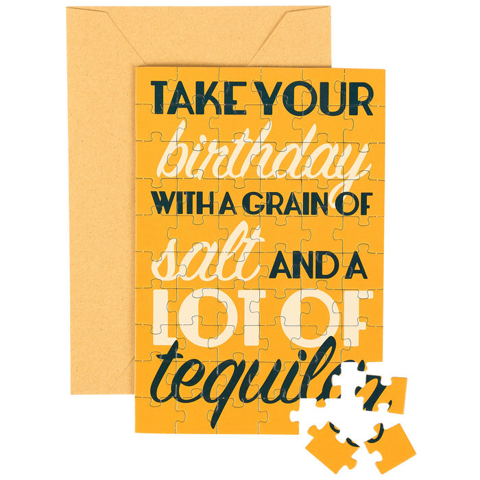 Jigsaw puzzle with humorous birthday message on a yellow background