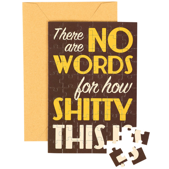 Jigsaw puzzle with humorous text on a brown background, featuring an envelope.