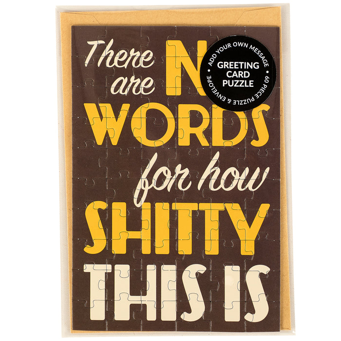 Jigsaw puzzle with text 'There are no words for how shitty this is' on a brown background