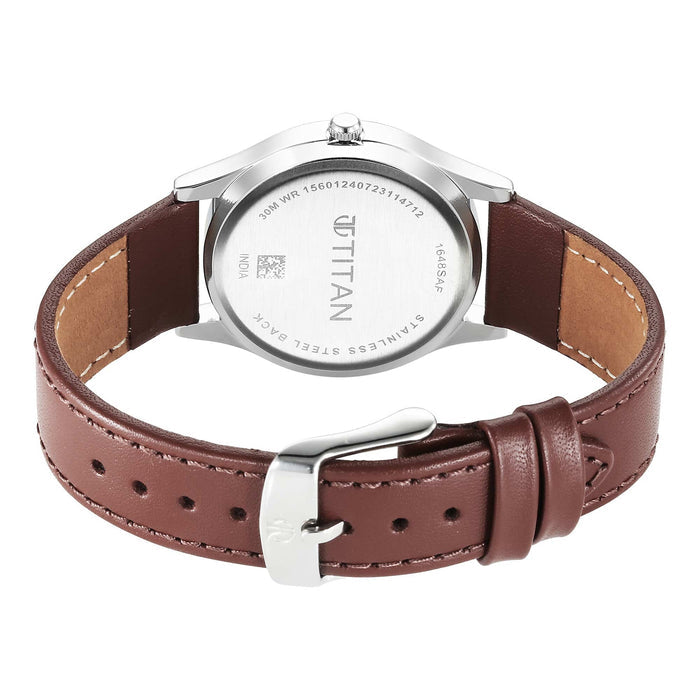 Titan Karishma Zing Quartz Analog Blue Dial Leather Strap Watch for Men 1648SL01