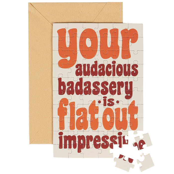 Puzzle with funny quote on a card with a brown envelope